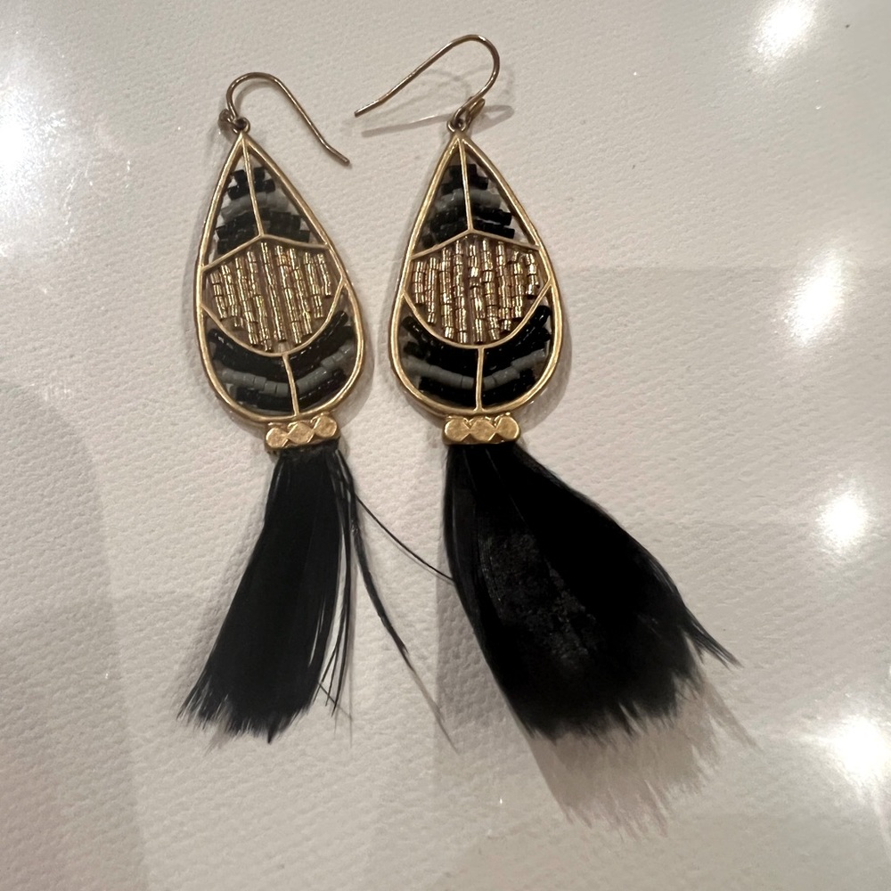 Beautiful feather and beaded earrings